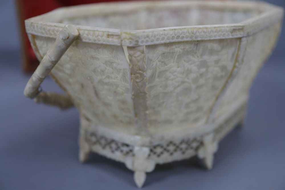 A Chinese ivory basket, boxed, width 11cm height 8cm